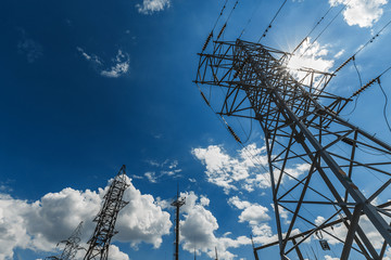 The electricity transmission pylon in daytime outdoors. Electricity tower standard overhead power...