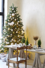 merry christmas card with christmas tree toys decoration presents close up photo on in pink room