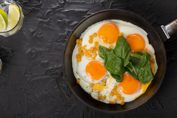 Fototapeta na wymiar Healthy breakfast. Fried eggs and bread and butter