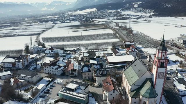 Aerial shot of the surroundings of Innsbruck in wintertime - Thaur, Austria
