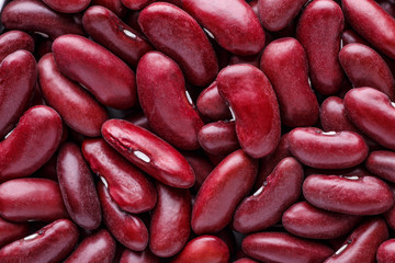 Beans of bean ( beans ).Texture of violet with dots beans.Beans handsome.Red Beans..Cocnept textures of legumes,Vegetables for diet and healthy eating.Organic food.