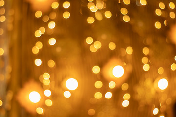 Bokeh blur of lights for decorating Christmas trees at Christmas and New Year's every year. As a light background