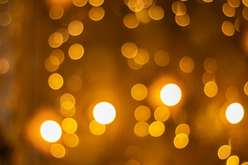 Fototapeta premium Bokeh blur of lights for decorating Christmas trees at Christmas and New Year's every year. As a light background
