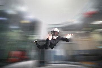 Two fingers. Fly men shows two fingers. Sky diver gestures by fingers. Teampleat skydiver.