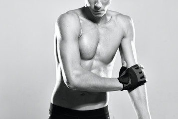 Naklejka premium muscular man with dumbbells