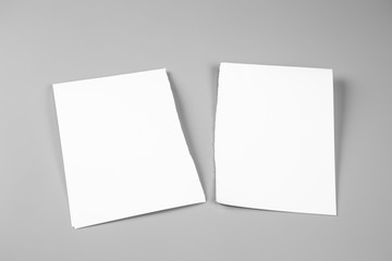Blank portrait mock-up paper. brochure magazine isolated on gray, changeable background / white paper isolated on gray