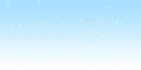 Sparse glowing snow Christmas background. Subtle f