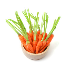 Sweet carrot, fresh carrot, baby carrot  in wooden bowl isolated on white background
