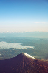 A birds eye view close-up the Mount Fuji ( Mt. Fuji ) and blue sky. Scenery landscapes of the...