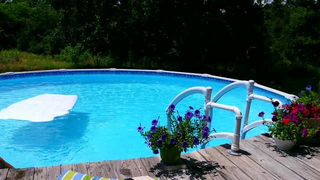 Splashing in a pool on a sunny day