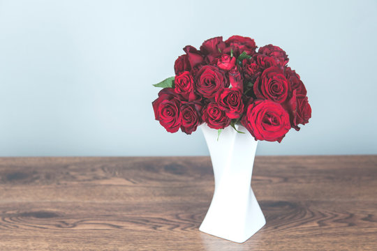 Vase Of Red Roses