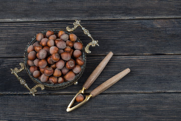 in an old vase hazelnuts and nutcracker