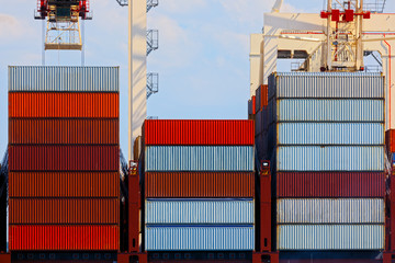 Large industrial port with cranes and cargo containers