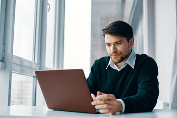 businessman working on laptop in an office