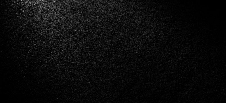 stylish dark textured grain simple background mock up pattern with shadows on edges and rays of light in the center of picture, copy space for your text 