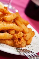 serving of fried squid on the table on a plate