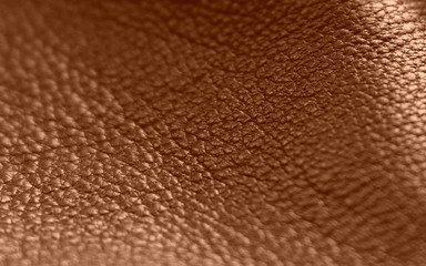 Leather. texture of genuine leather is brown. The structure of the skin material close-up. 