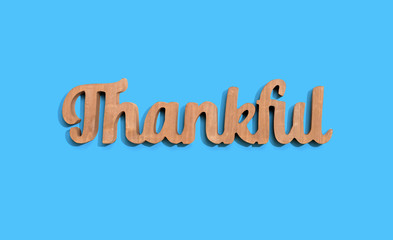Thankful wooden text from above - overhead view