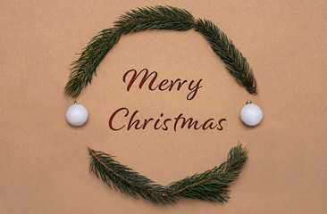 Gałązki ułożone w krąg ze świątecznymi życzeniami © Exploder