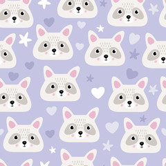 Seamless children's print for boys with cute raccoon heads on a blue  background.