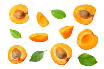apricot fruits with slices and green leaf isolated on white background. top view