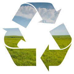 Recycling logo isolated on white, with an image of spring prairie with sky; concept of clean water and air recycled in nature