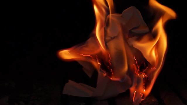 lit crumpled paper in the oven fire from the paper