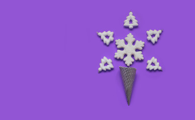 Minimum Christmas.Cream cone silver with snowflake and trees