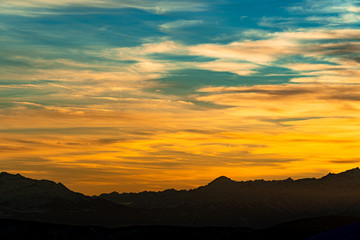 Sunset sky with beautiful orange and pink and blue colors, background