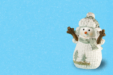 Cute snowman on blue background. Christmas, new Year banner with copy space for your text