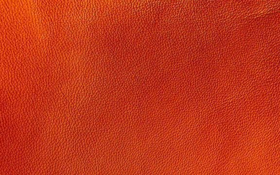 Leather. texture of genuine leather is brown. The structure of the skin material close-up. 