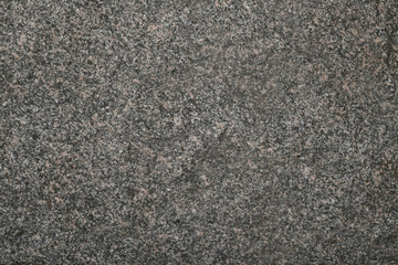 The granite slab, part of the wall of the house, is also similar to the floor too