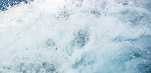Fototapeta na wymiar Background of white foam of the sea