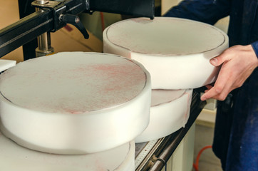 Making upholstered furniture, preparing a seat for a bar stool, applying glue with a spray gun