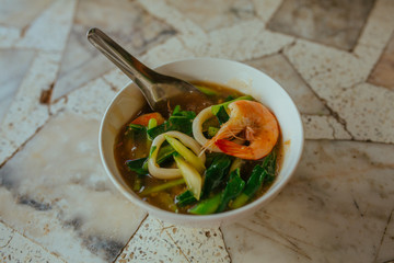 Seafood soup with squid and shrimp in Asia