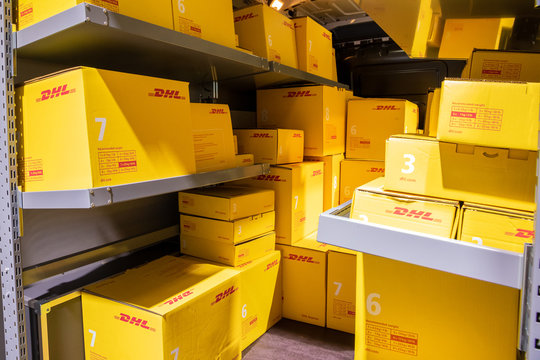 BRUSSELS - JAN 18, 2019: DHL delivery van showcased at the 97th Brussels Motor Show 2019 Autosalon.