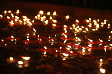 Bokeh of the candle on the golden mounth