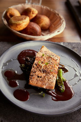 Gourmet saucers on wooden table