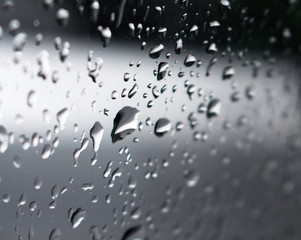 Raindrops on a window with bokeh