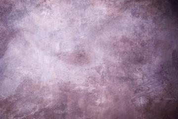 Grungy purple painted background or texture