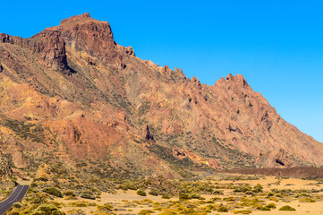 Picturesque And Winding Road Crossing The Volcanic Desert In El Teide National Park. April 13, 2019. Santa Cruz De Tenerife Spain Africa. Travel Tourism Street Photography.