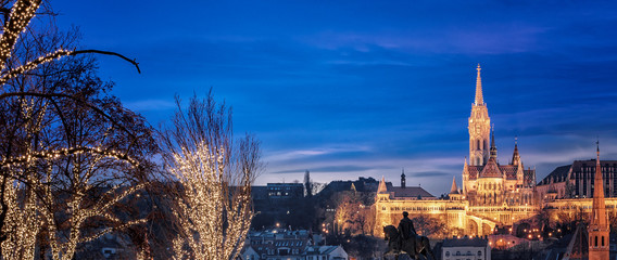 View on the famous Fishermen's Bastion in Budapest in winter with christmas lights