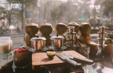 Coconuts in a bar on the street in Ho Chi Minh city