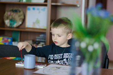 Boy is painting