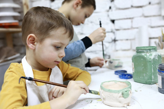 Brothers Paint Clay Pots