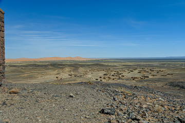 Fototapeta na wymiar Typical desert landscape in the Atlas of the Sahara desert in Morocco