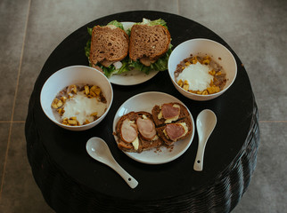Breakfast, Sandwich with Hum and salad on black table