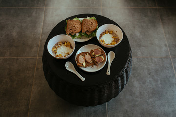Breakfast, Sandwich with Hum and salad on black table
