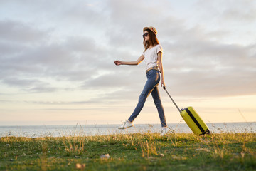 young woman with suitcase