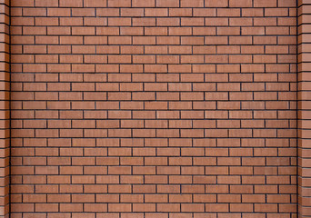 Wide red brick wall texture. background